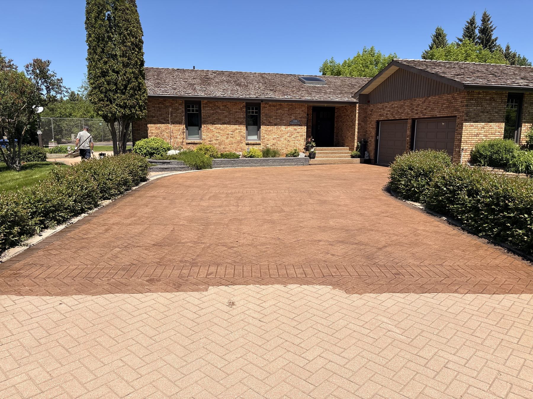 Herringbone paver driveway, before and after sealing